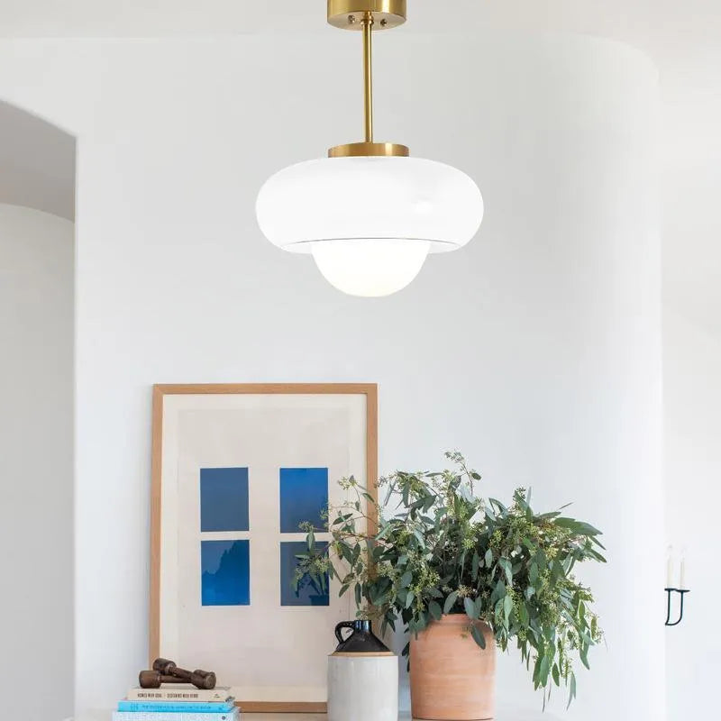 Bauhaus style three-headed pendant light with milk white egg tart glass shades