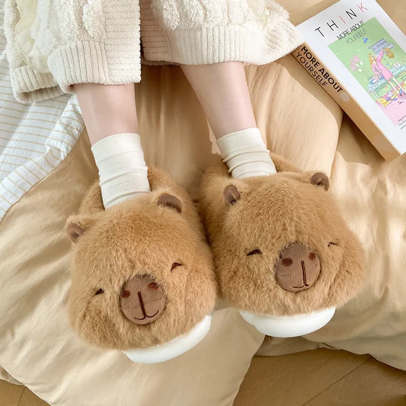 Light brown women's winter slippers with plush upper and cartoon pattern