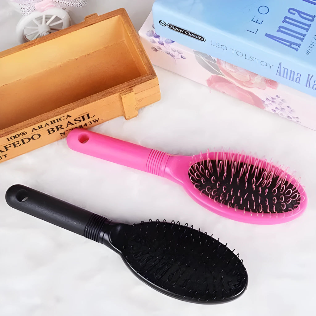 Black ring tooth airbag comb for hair extensions on pink background showing dimensions