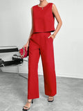 Red sleeveless round neck top with matching wide leg trousers two-piece set