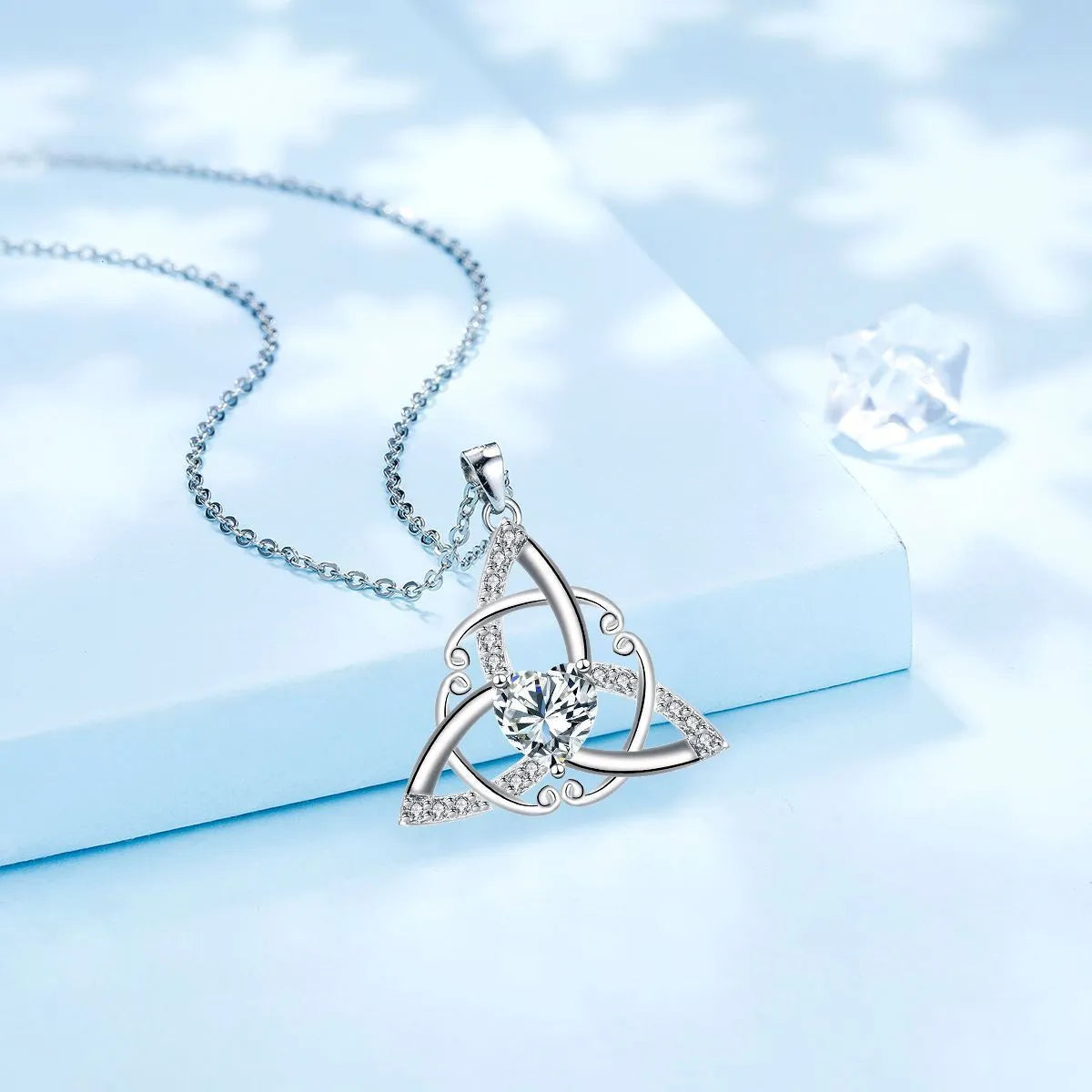 Celtic knot geometric pendant necklace in copper with electroplated blue finish for women