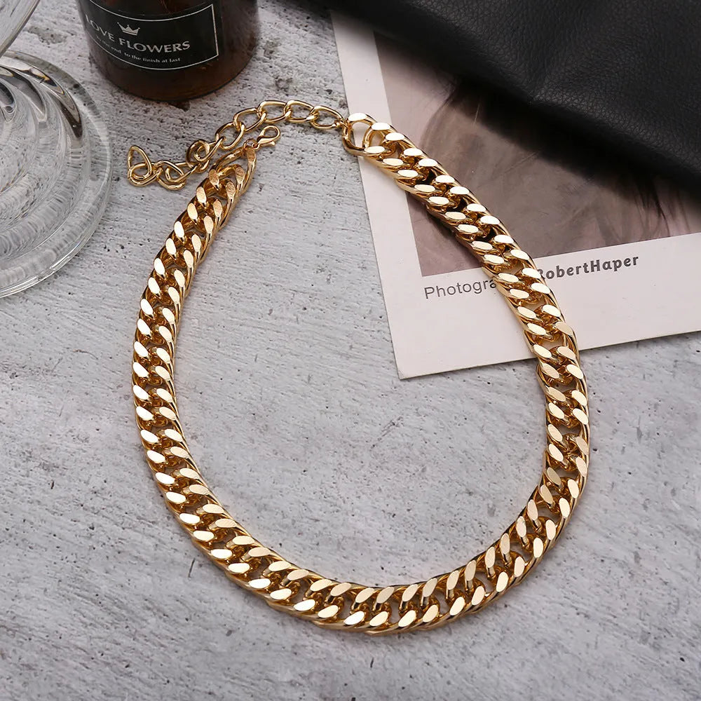Gold women's thick chain alloy necklace measuring 32cm long and 6cm wide.