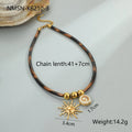 Geometric leopard stainless steel necklace with gold electroplated finish on adjustable 41-50cm chain