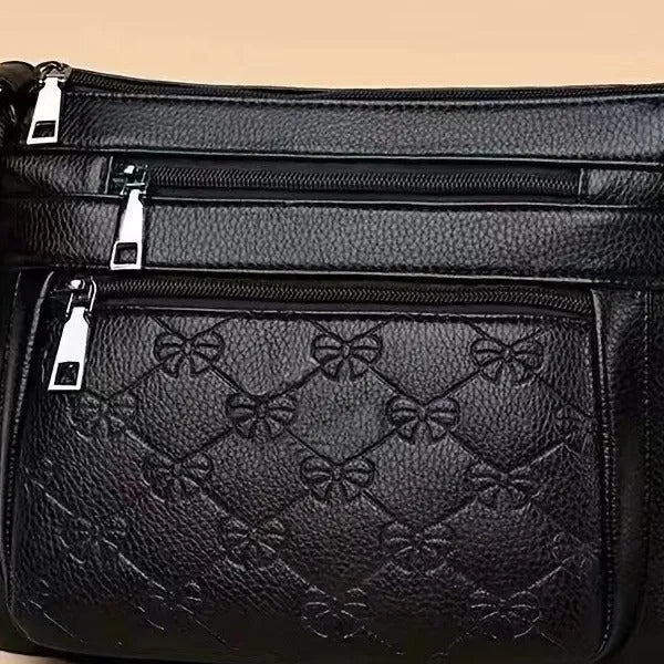 Butterfly Black women's crossbody messenger bag with embossed PU leather and slit pocket