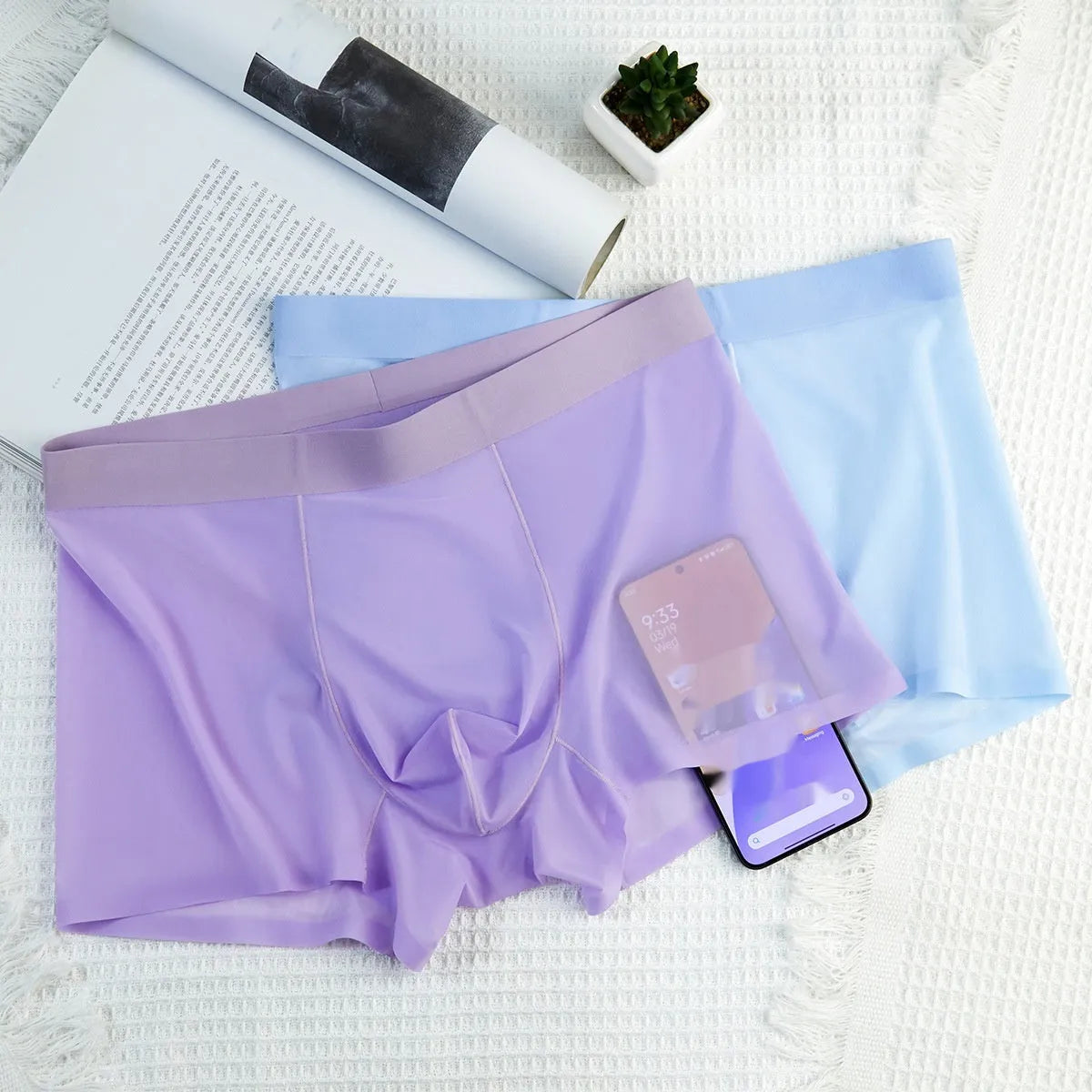Ultra-thin ice silk men's boxer briefs in a solid colour on a white background.