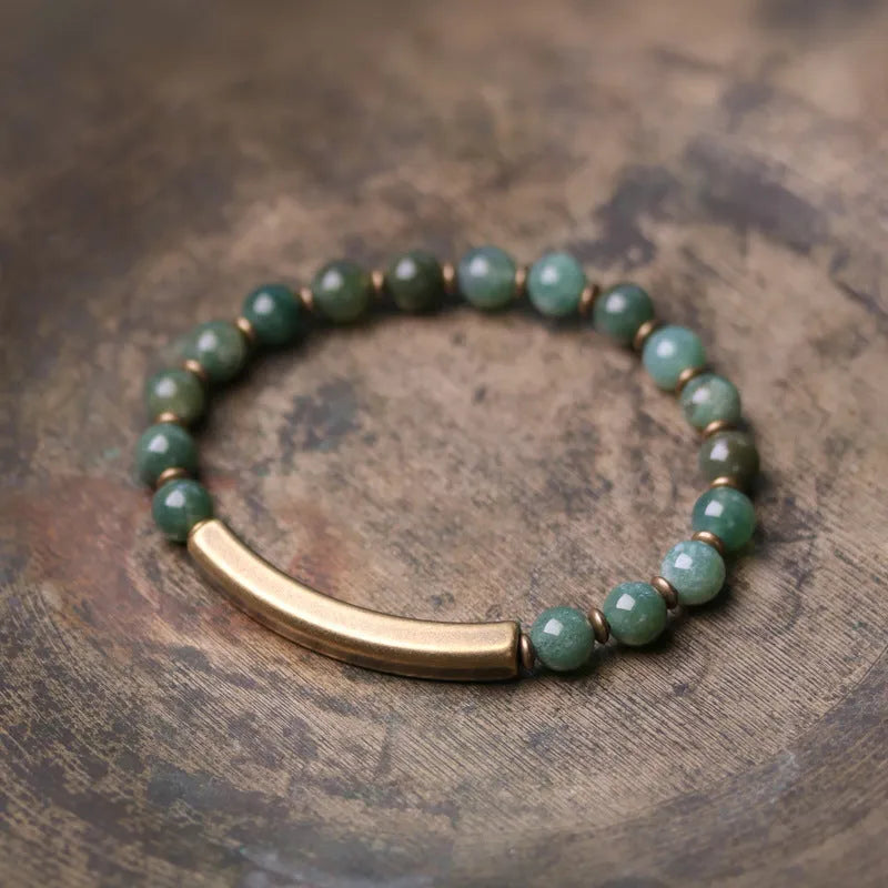 Layered ethnic bracelet with natural stone beads and brass fittings in adjustable sizing