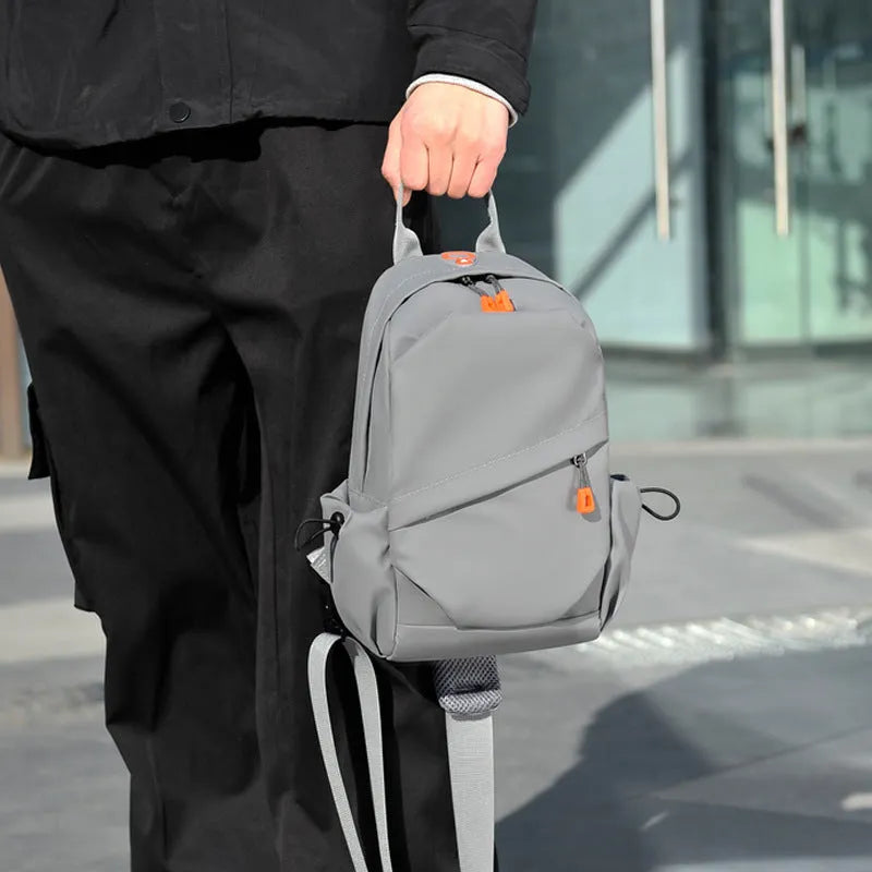 Black and grey mens casual crossbody bag made from waterproof polyester with single shoulder strap