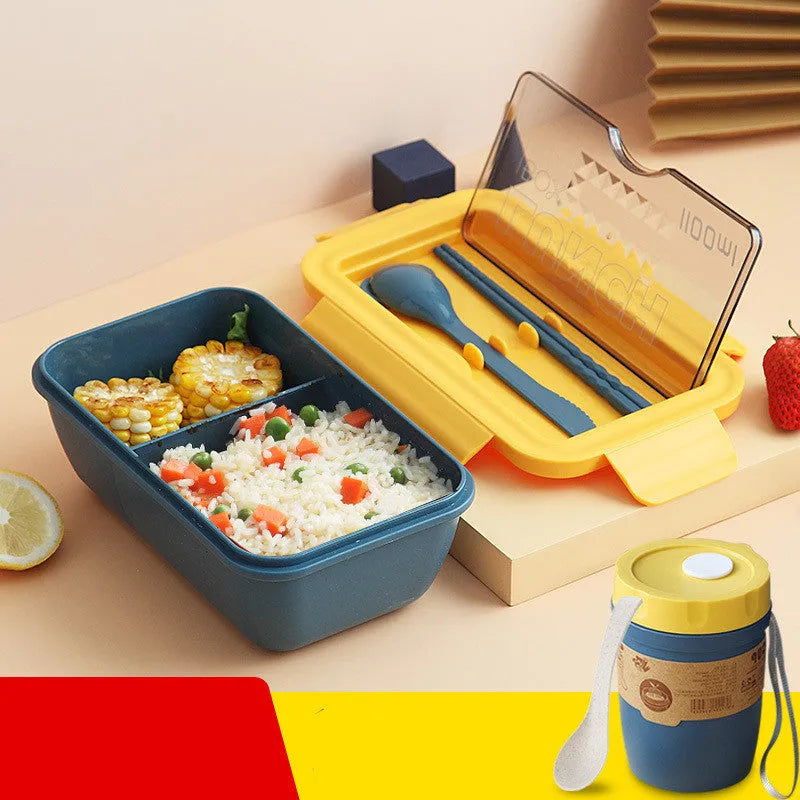 Green Nordic-style plastic bento lunch box with four separate food compartments.
