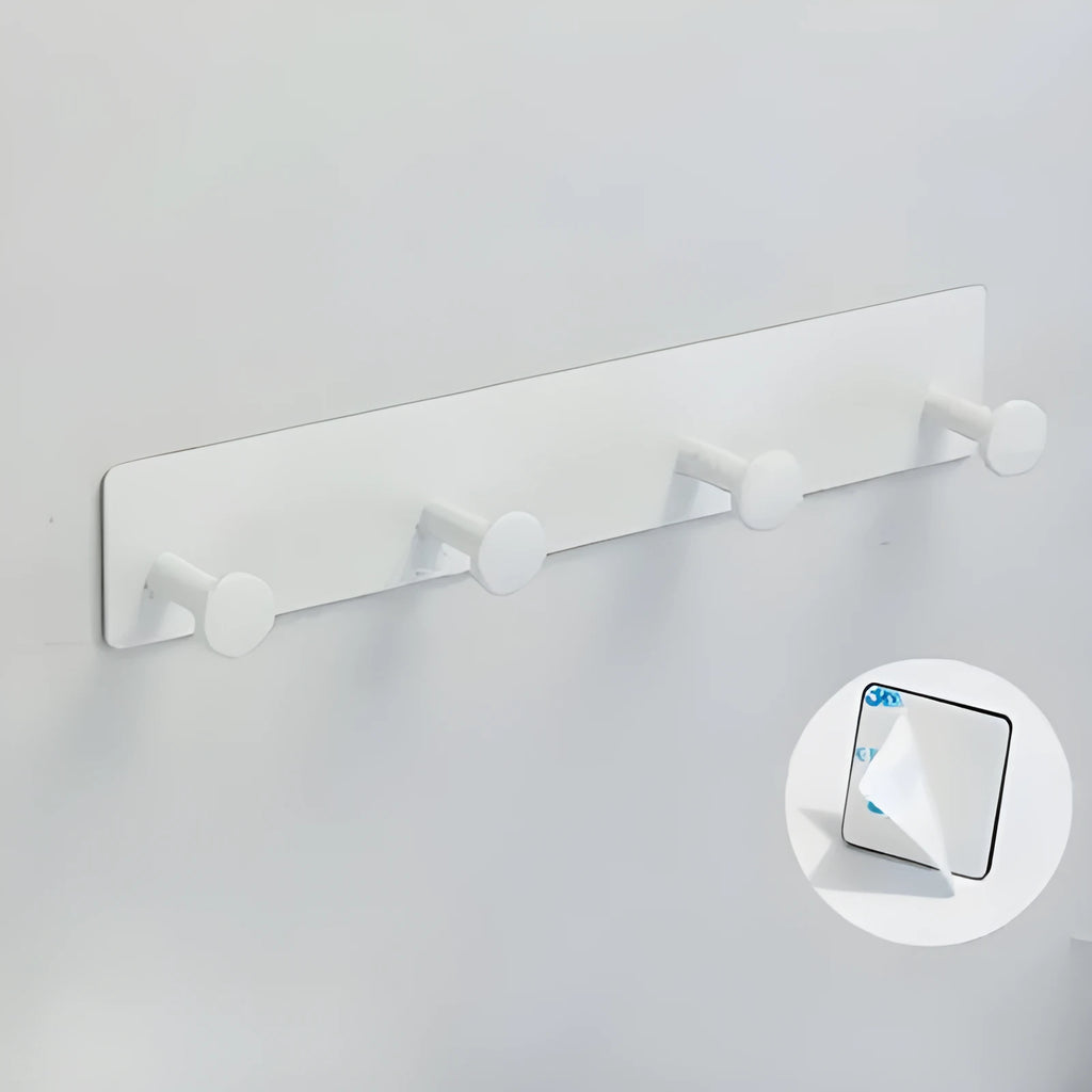 Adhesive mushroom-style wall hook with multiple rows for towels, shown with black double-sided tape.