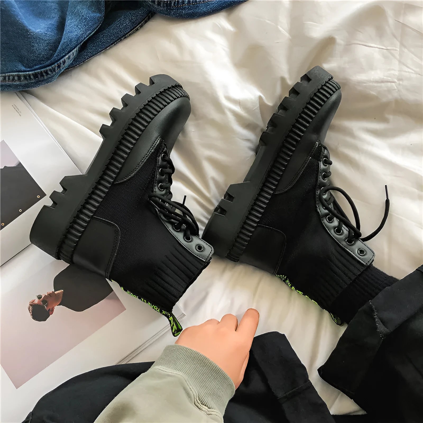 Men's black platform Dr Martens boots with 8 eyelets and a side zipper on a frosted cowhide upper.