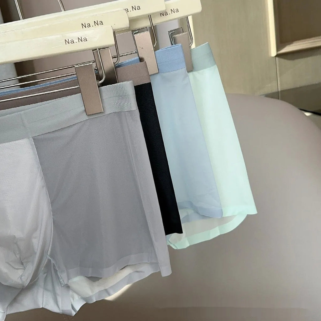 Ultra-thin seamless men's boxers in Ice Silk fabric showing honeycomb crotch design.