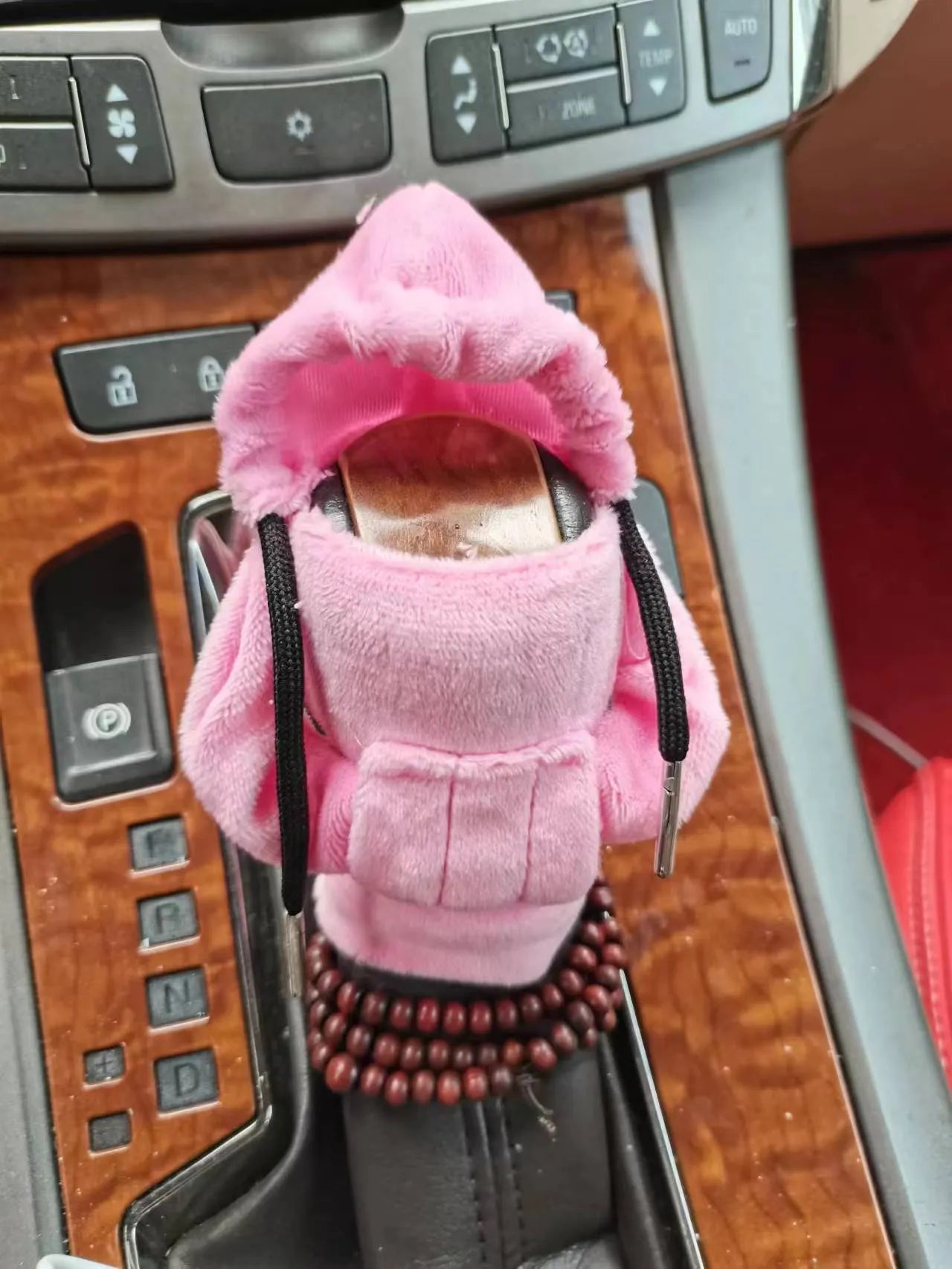 Dutch velvet car gear handle sleeve in multiple colour options on a car gear stick