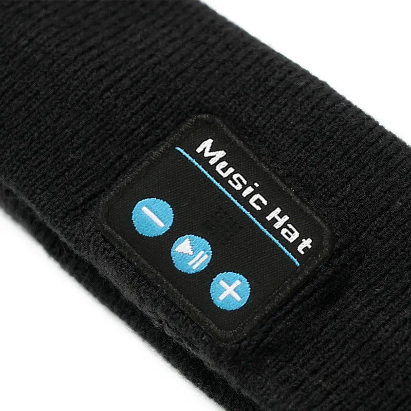 Bluetooth sports headband in black colour with removable washable fabric and wireless audio functionality