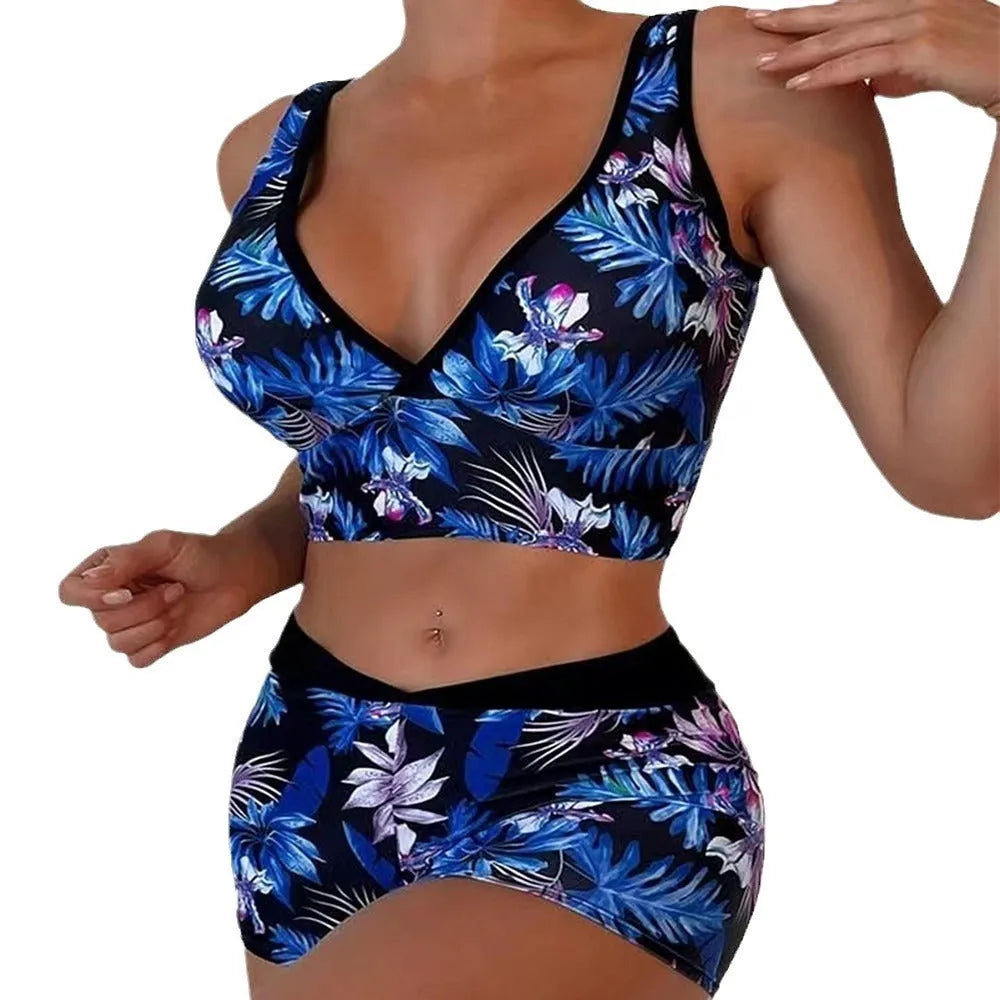 Women's two-piece swimsuit set with boxer brief bottoms in a printed design.