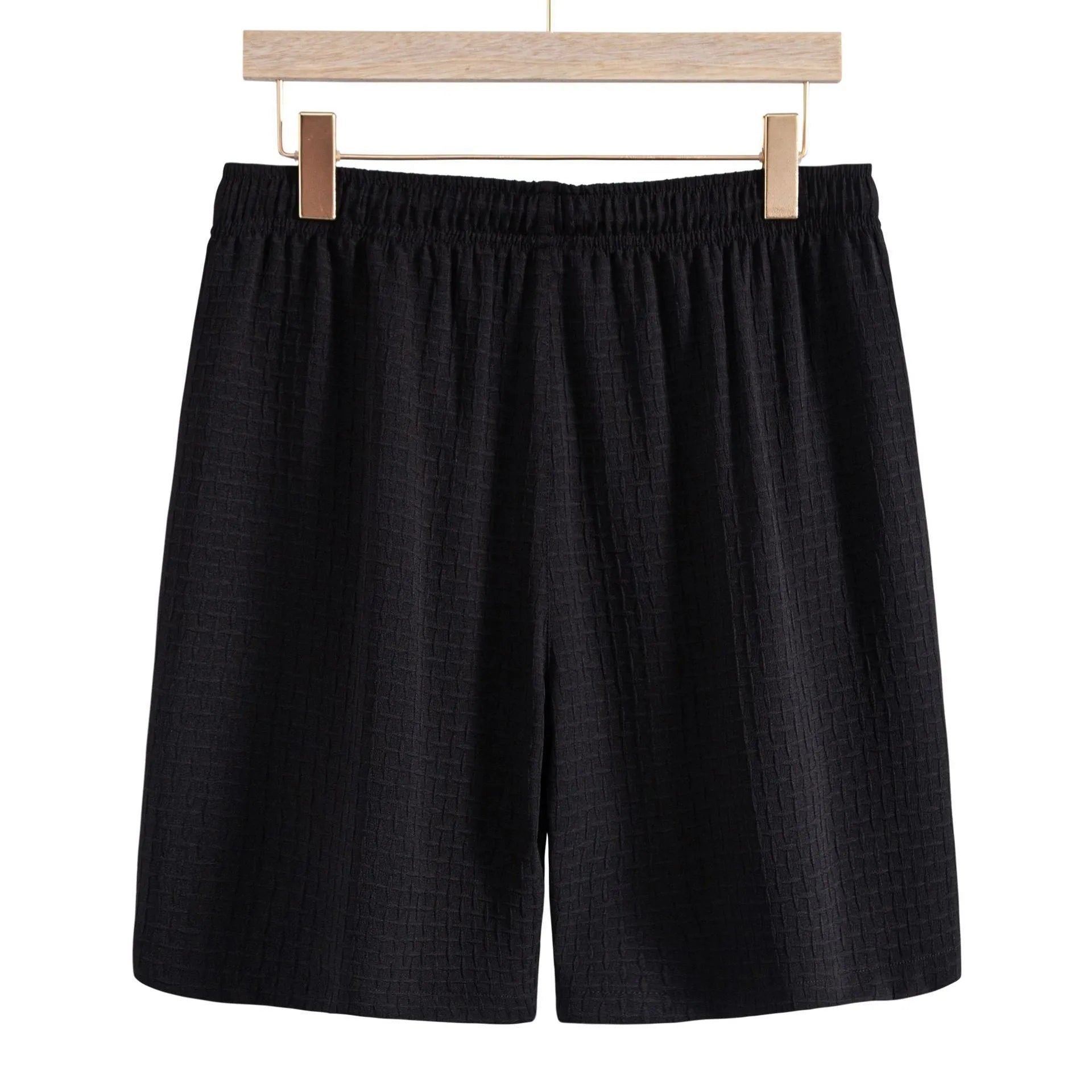 Men's loose cotton blend beach suit with short sleeve cardigan shirt and shorts in black.
