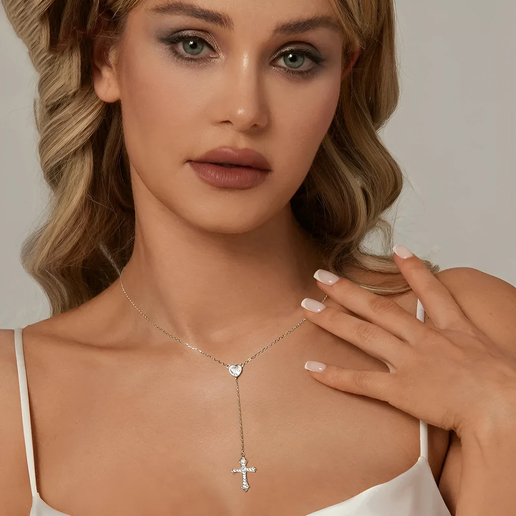 Simple silver love cross pendant on a V-neck O-ring chain, colour BSN384.