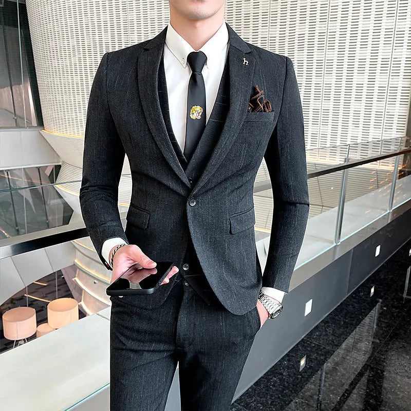 Men's slim fit business suit in black or dark grey with adhesive interlining construction