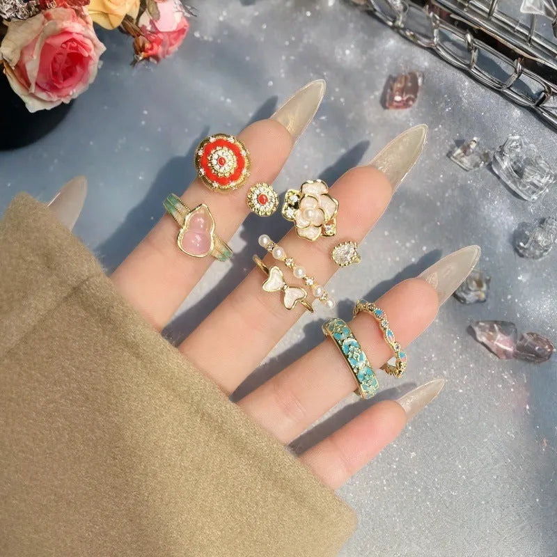 Adjustable vintage-style copper ring with a gourd shape, floral design, and zircon stones.