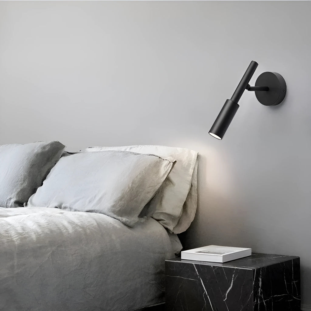 Modern wrought iron wall lamp in black with three colour light options for bedroom or living room