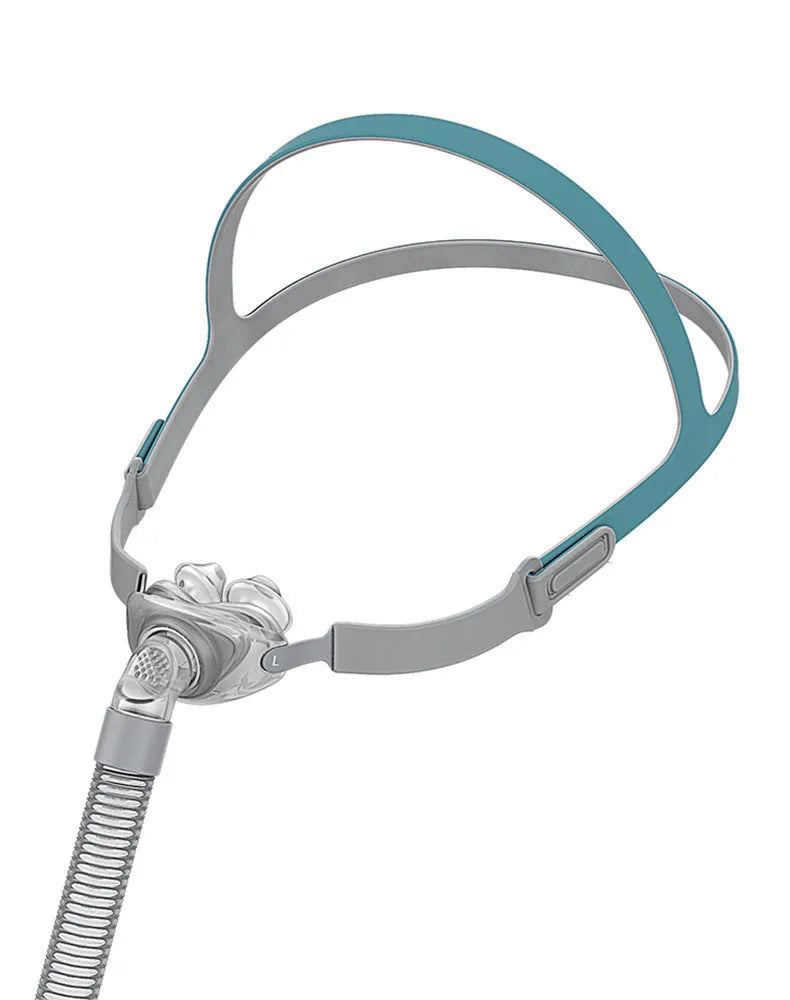 Nasal pillow ventilator mask with plastic plug, silicone cushion, and thickened headband