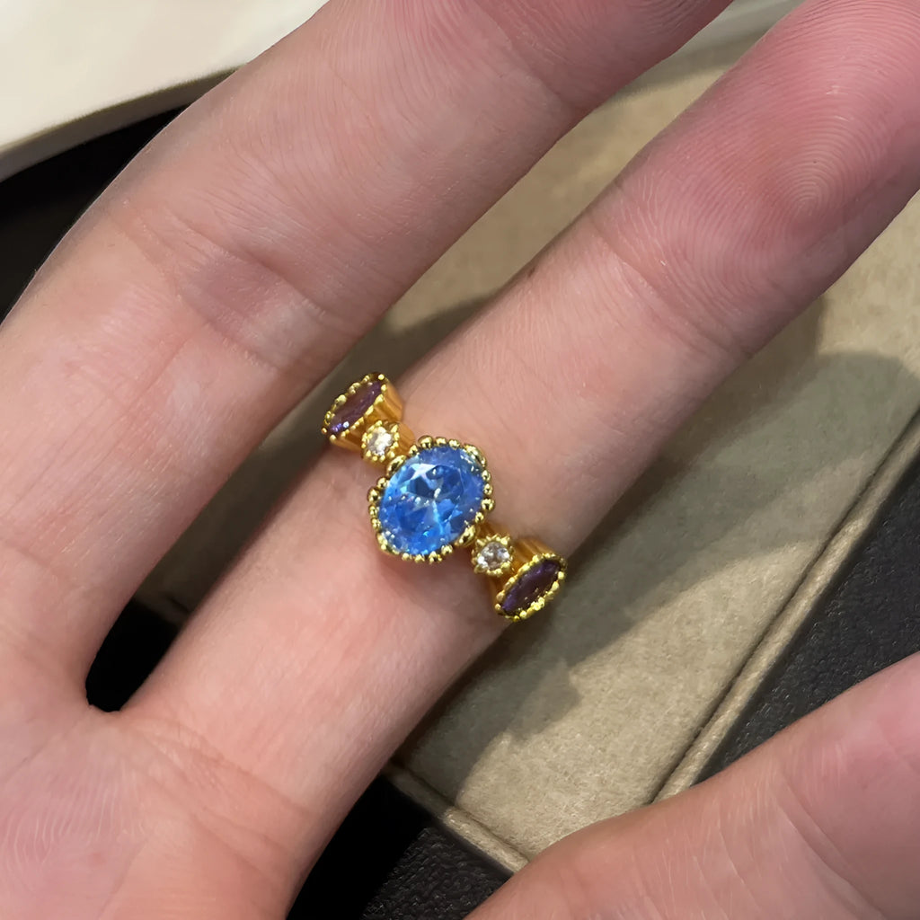 Vintage copper ring with blue gemstone and snowflake ice flower design