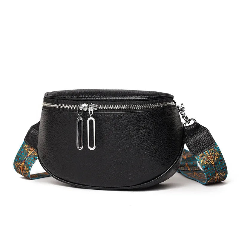 A soft black PU leather women's messenger bag with a saddle shape and cross-body strap on a white background.