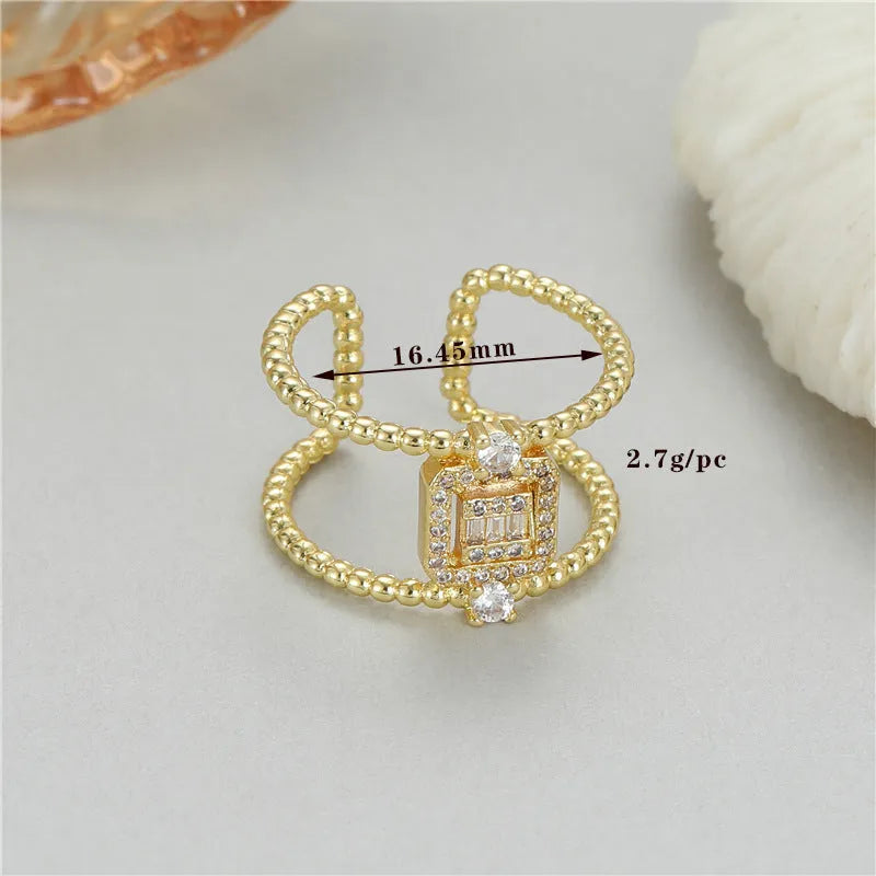 Open ring with adjustable opening in 14K copper-plated gold finish, U-shaped asymmetric design