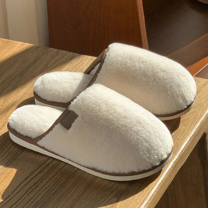 Solid colour winter plush slippers with decorative car stitching and non-slip PVC sole