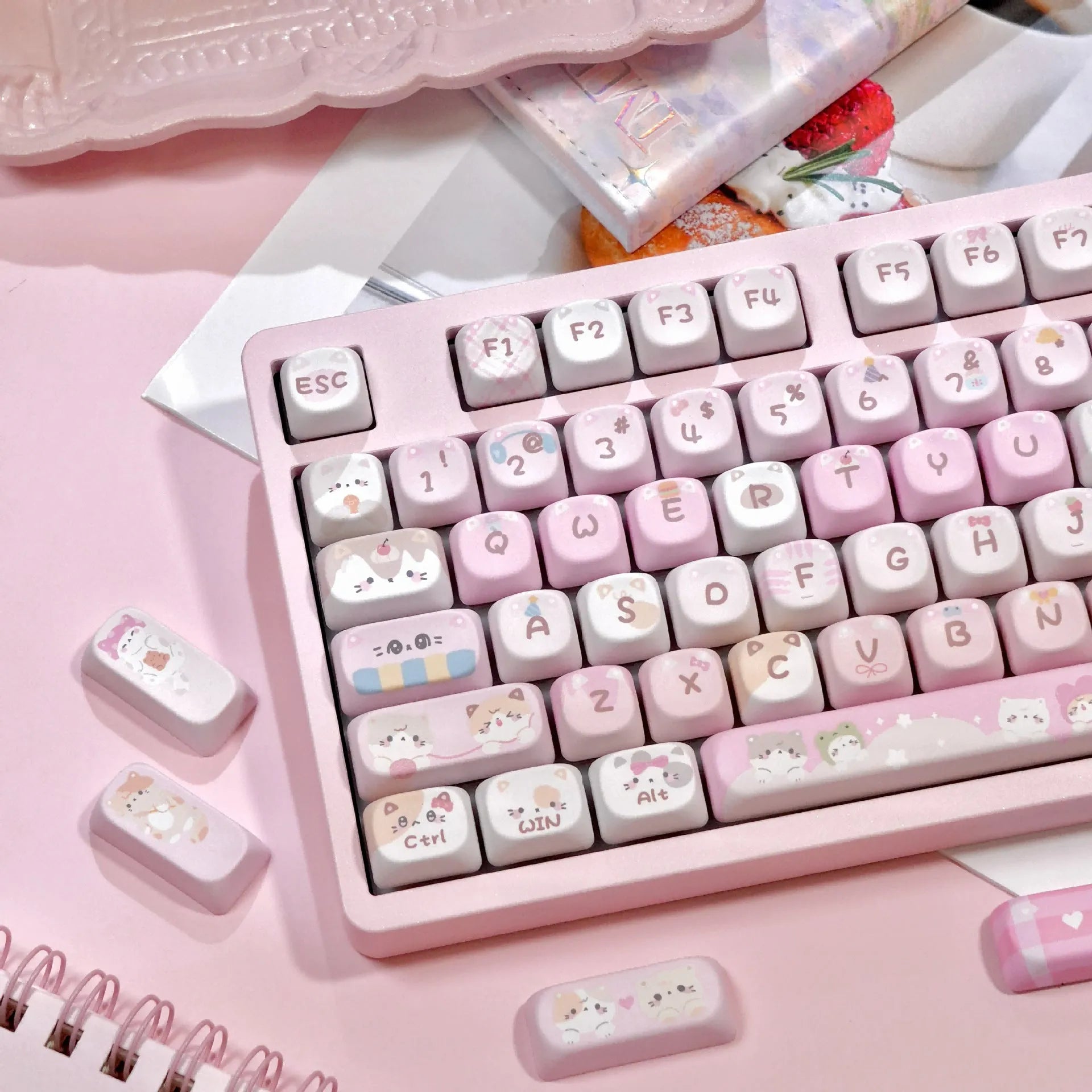 Pink cartoon MOA height plastic keycaps with five-sided sublimation arranged in a full set layout.