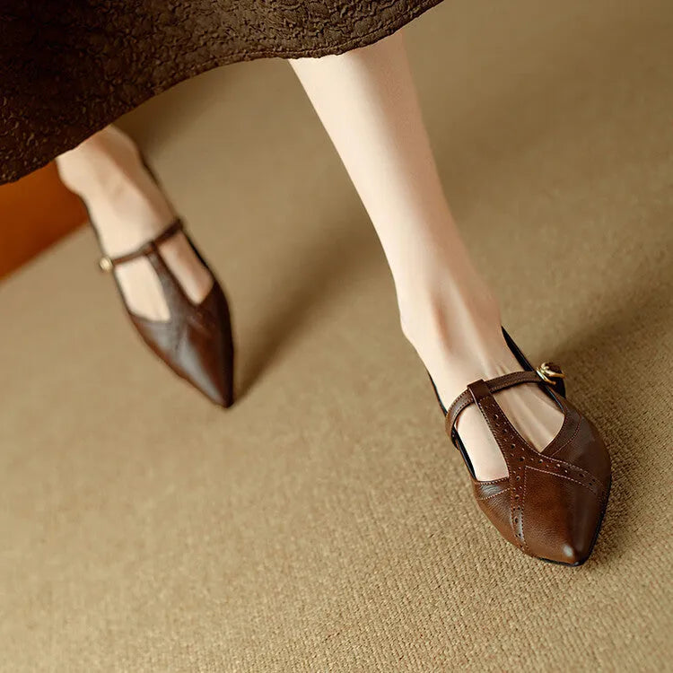 Brown women's cowhide leather casual flat shoes with round toe and low-cut design.