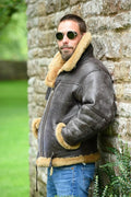 Men's brown synthetic fur coat with straight hem and side pockets for winter wear