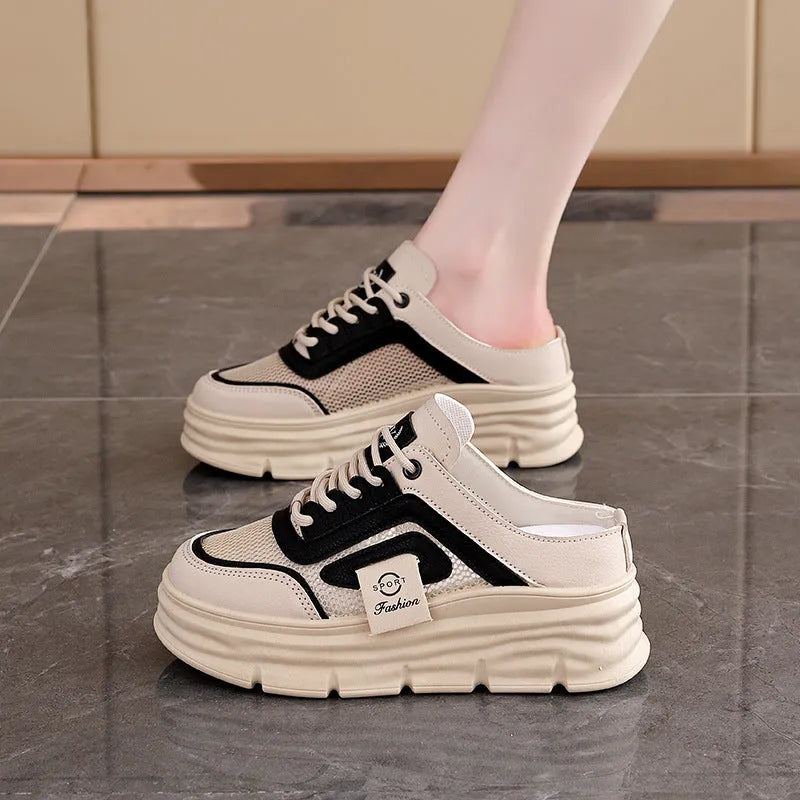Women's black mesh half slippers with round toe and height increasing insole on rubber sole