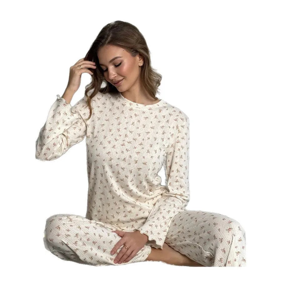 Women's white floral print pyjama set with bell sleeve top and wide-leg trousers