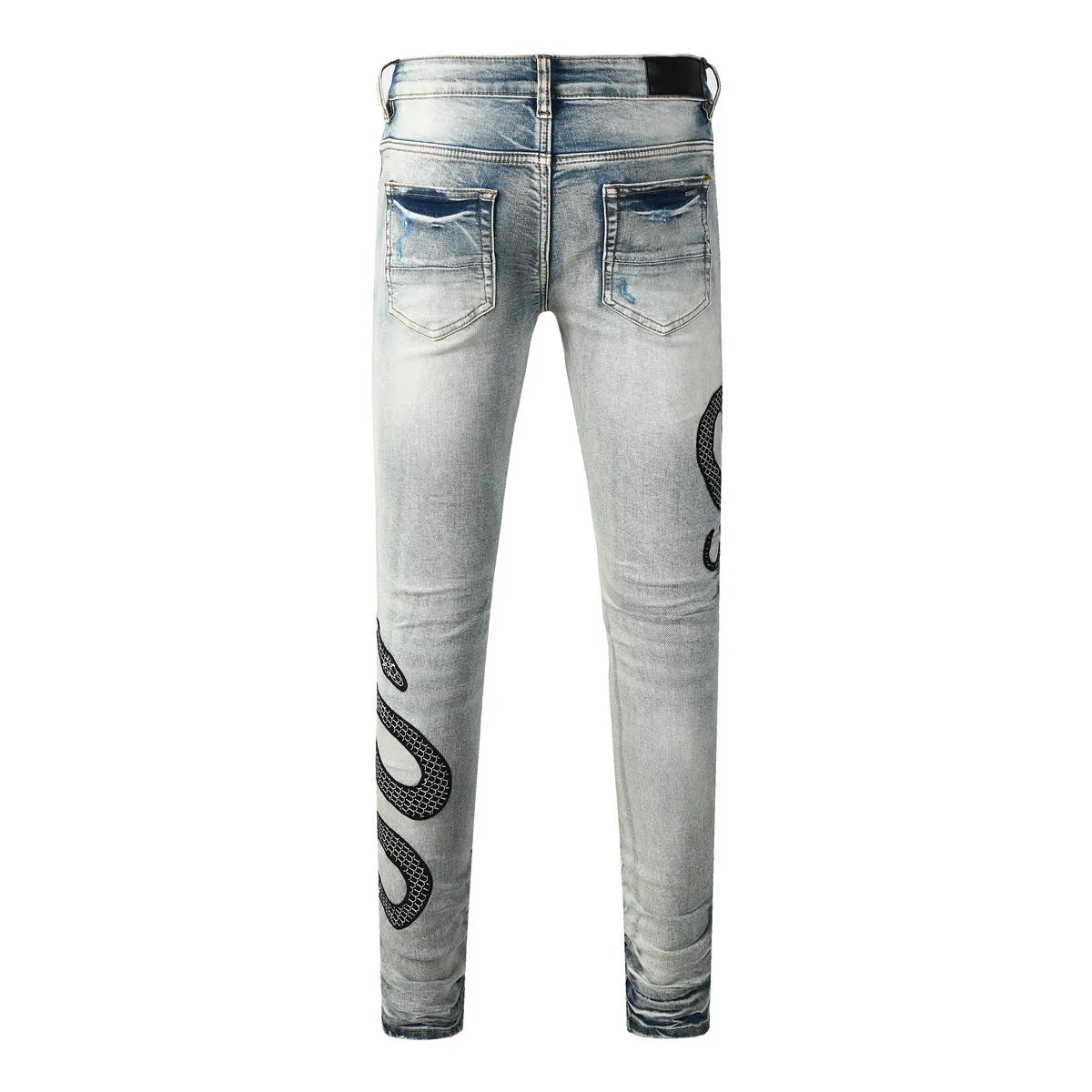 8934Blue distressed skinny jeans with a retro wash and button fly on a mid waist