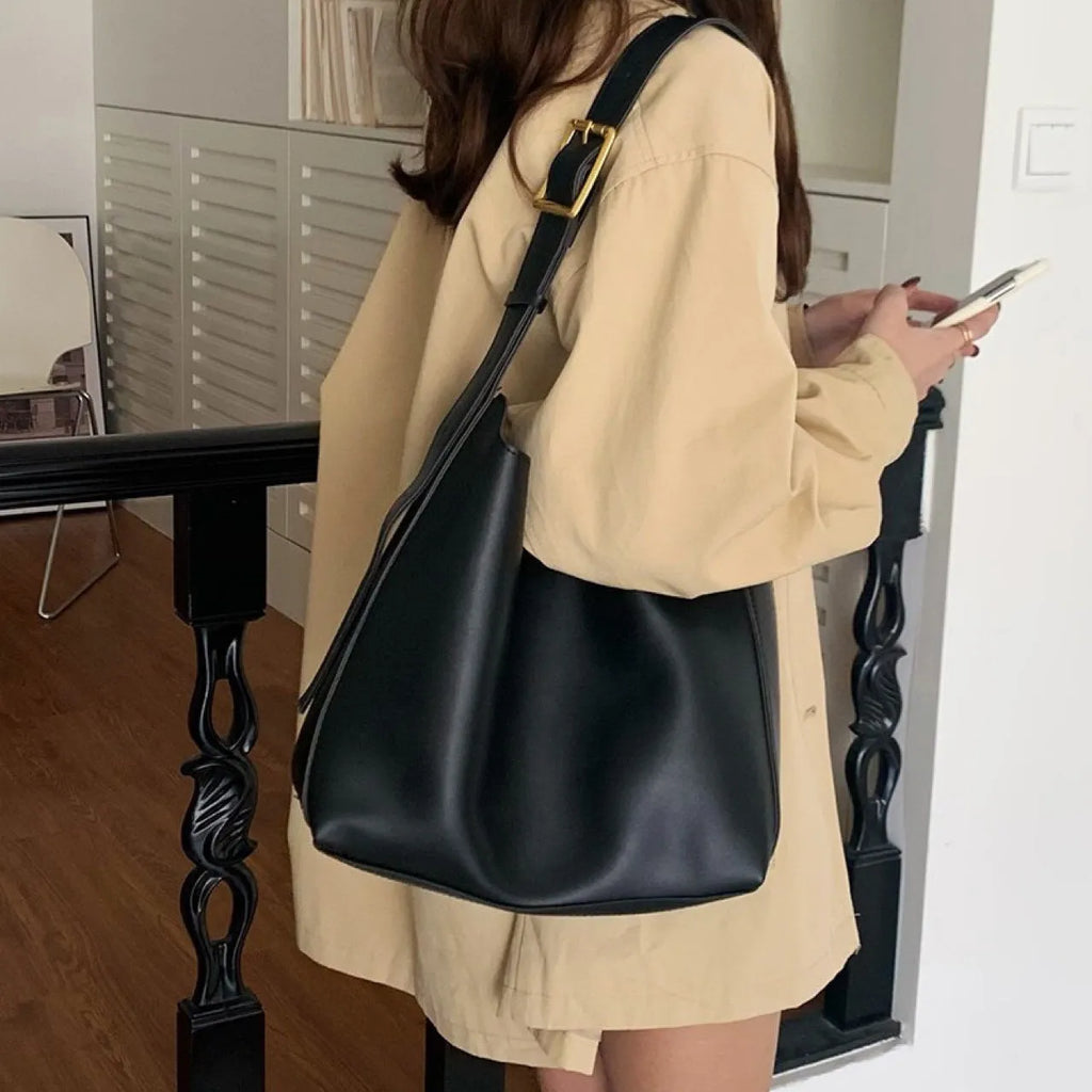Women's black and brown PU shoulder bags with swing thread detail, dimensions 28×32×12cm