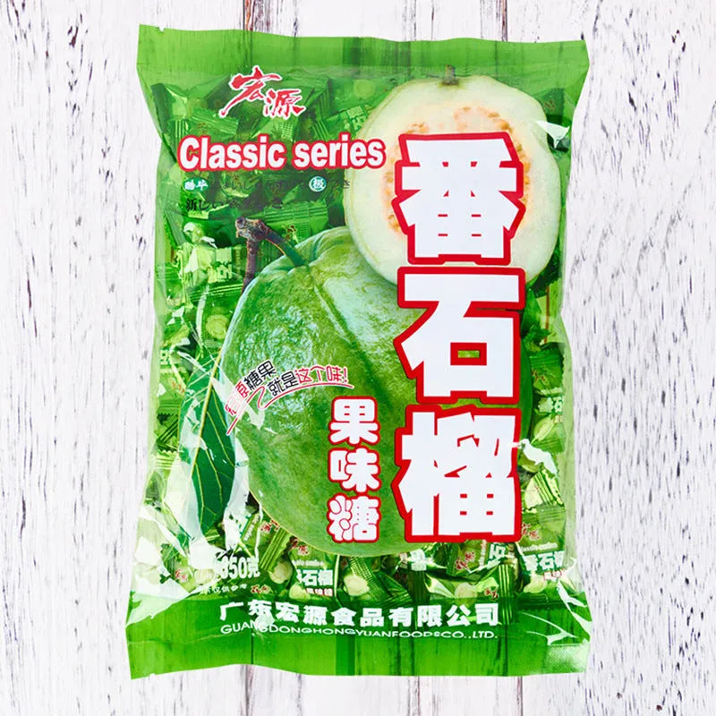 Assorted Chinese fruit flavoured hard candies: guava, plum sugar, and tangerine peel in separate bags.