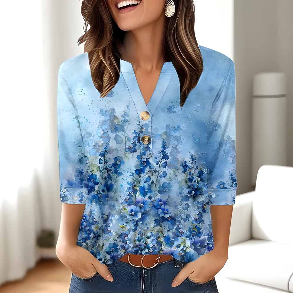 Women's loose-fit casual V-neck top with a 3D pattern design in various colours.