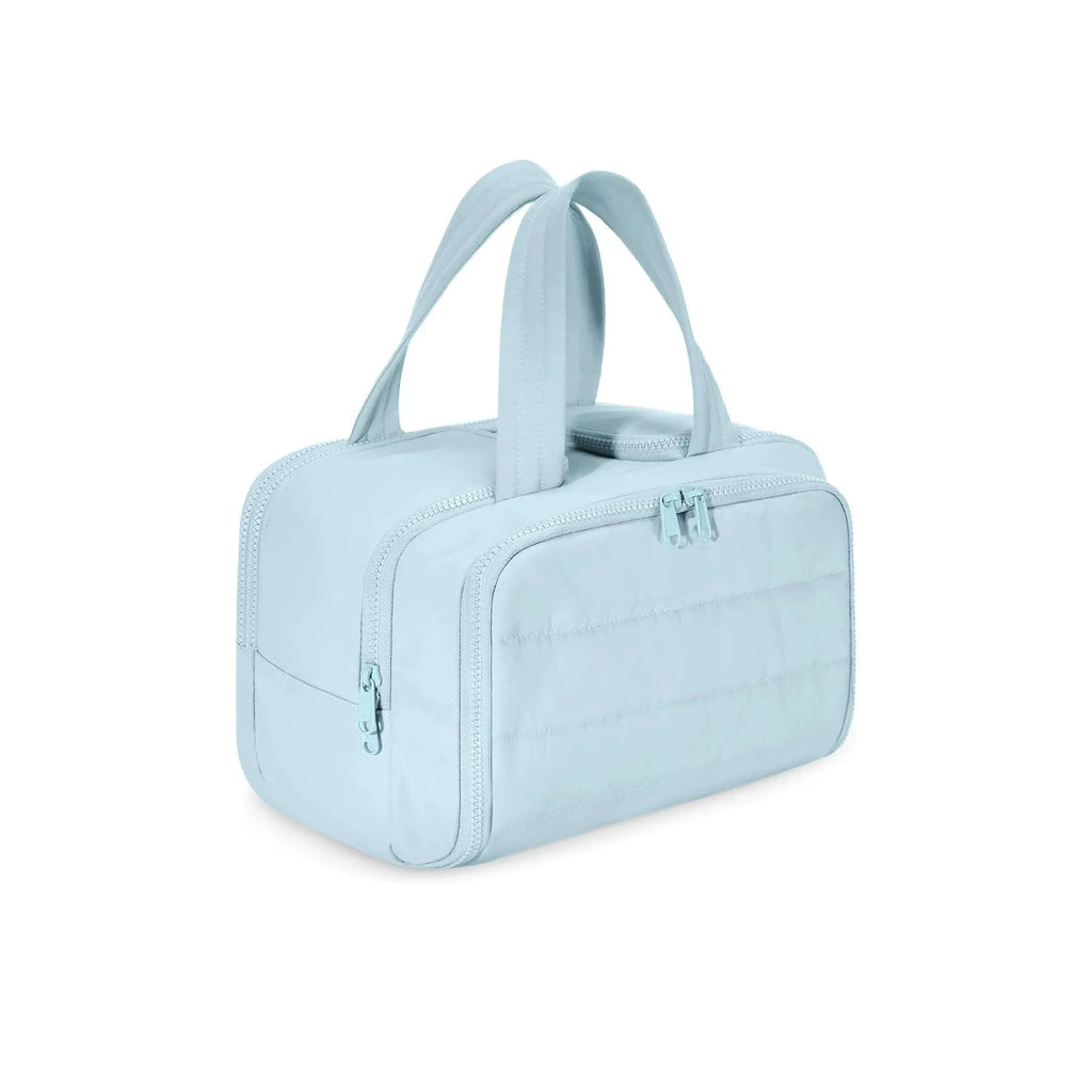 Lightweight large capacity travel toiletries bag open showing fluffy polyester interior in available colours