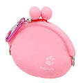 Yellow silicone dog training treat pouch with hook-and-loop waist strap, shown with dog biscuits.