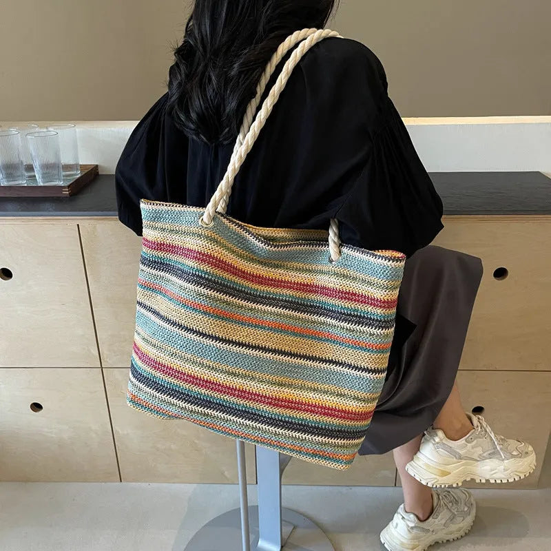 Blue woven nylon single-shoulder bag with straw-inspired texture pattern