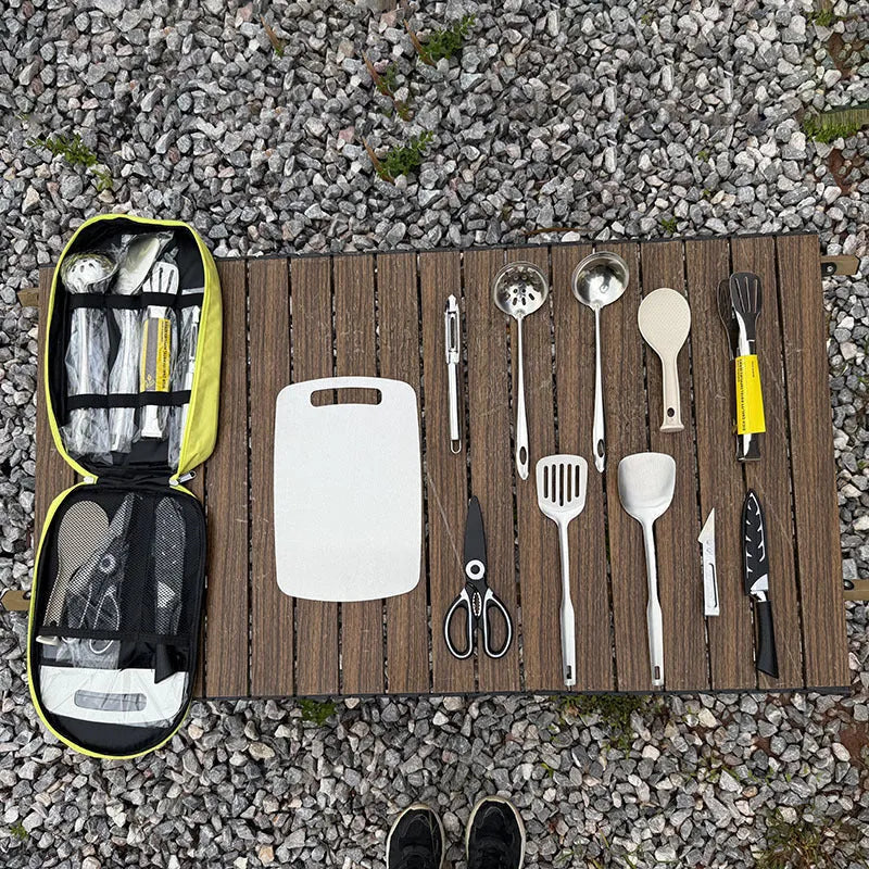 Portable picnic kitchenware storage bag containing 12 pieces of stainless steel cutlery and utensils.