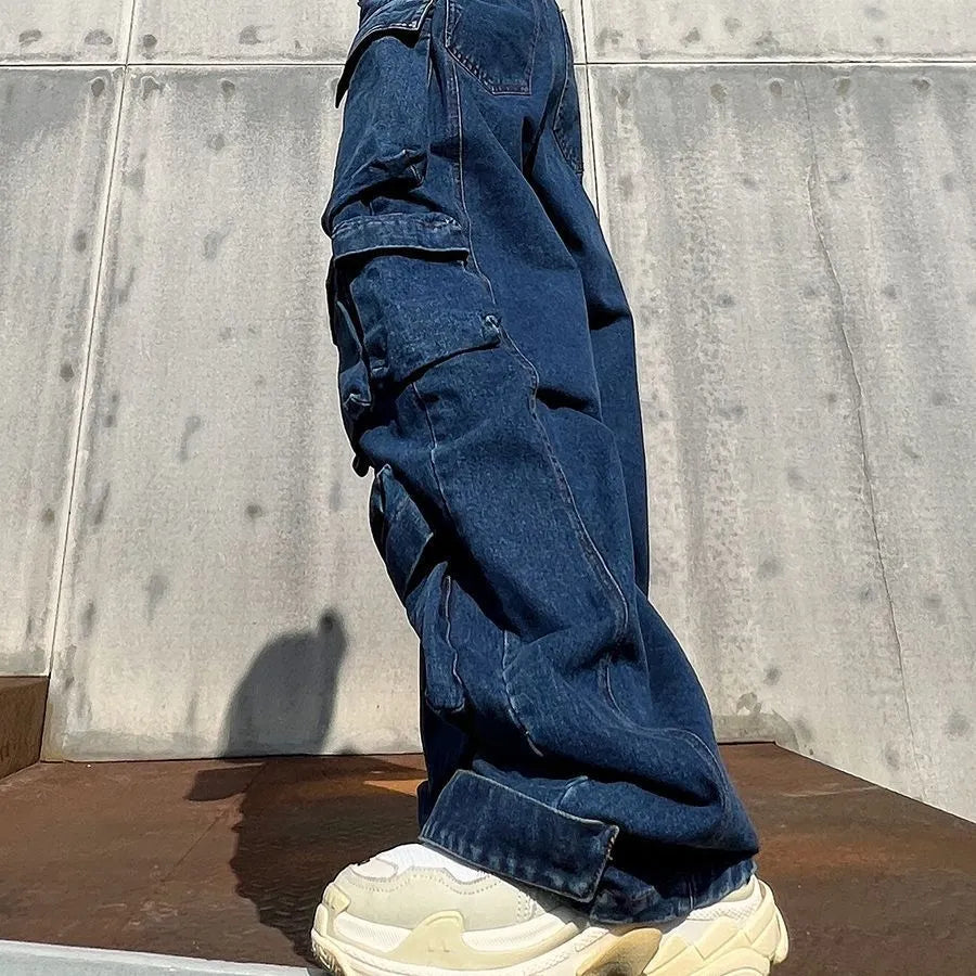 Dark blue distressed women's wide-leg jeans with a high waist and multiple pockets.