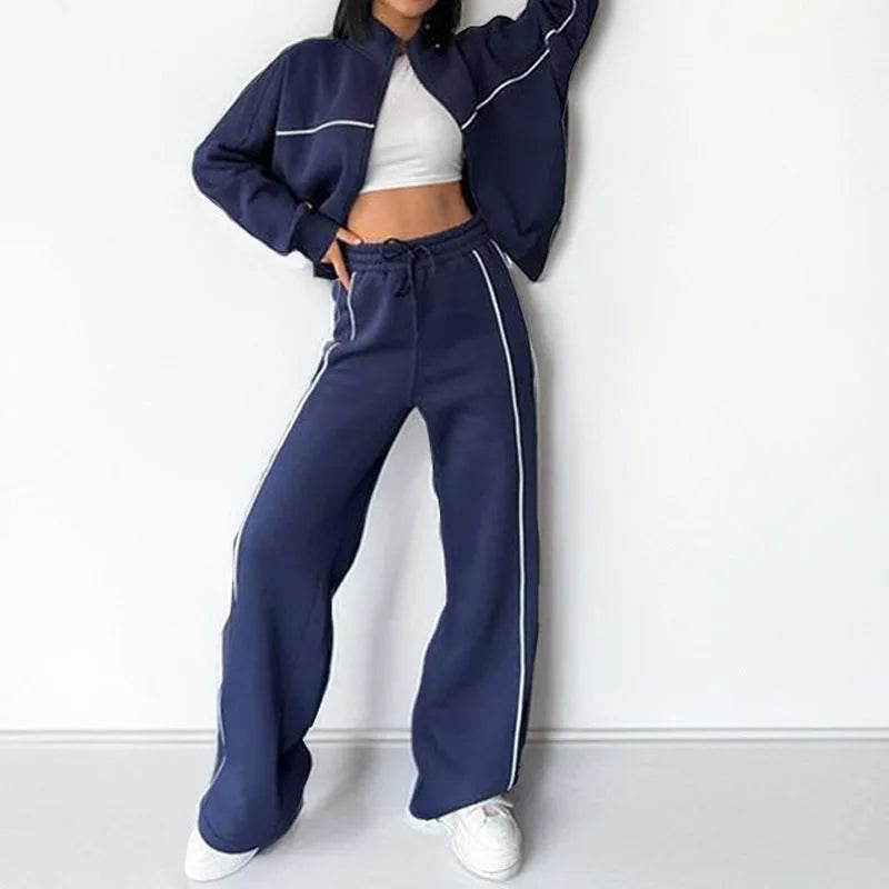 Casual polyester suit with zip hoodie and striped lace-up trousers in apricot colour.