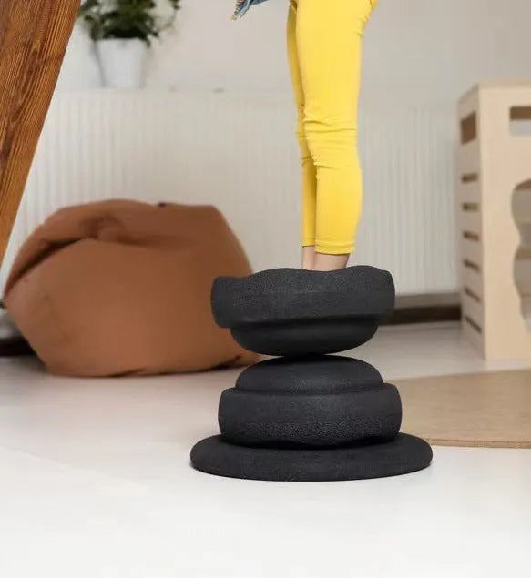 Plastic surf balance board for children in mixed colour wood and black wood designs.
