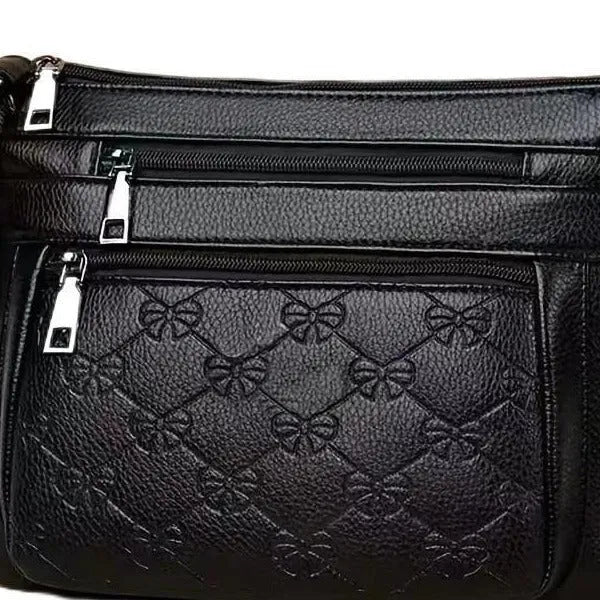 Butterfly Black women's crossbody messenger bag with embossed PU leather and slit pocket