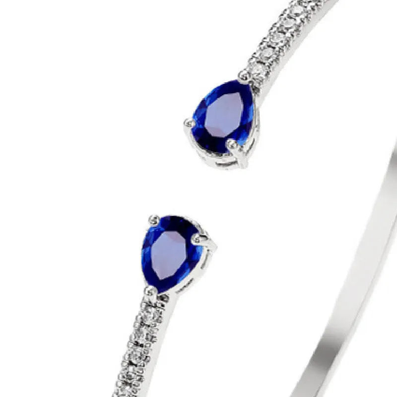 Personalised multi-zircon copper bracelet showing white and blue colour options with simple design