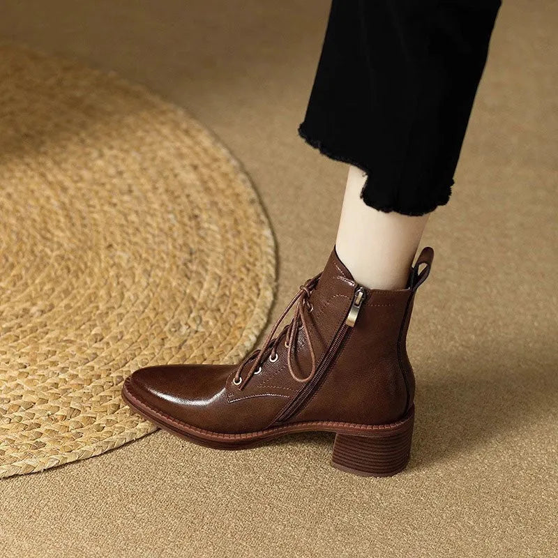 Women's black pointed-toe short tube boots with 5.5cm heel and artificial PU upper