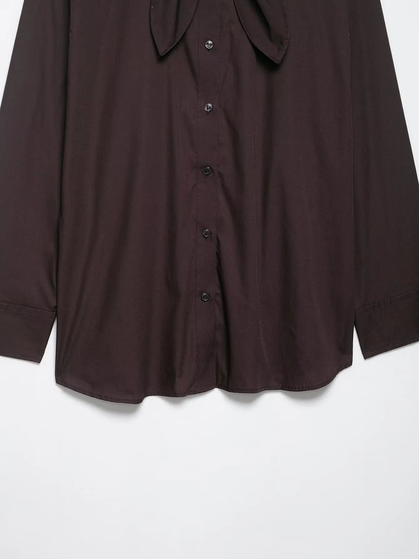 Brown women's poplin shirt with a loose fit, long sleeves, and a self-tie bow scarf collar.