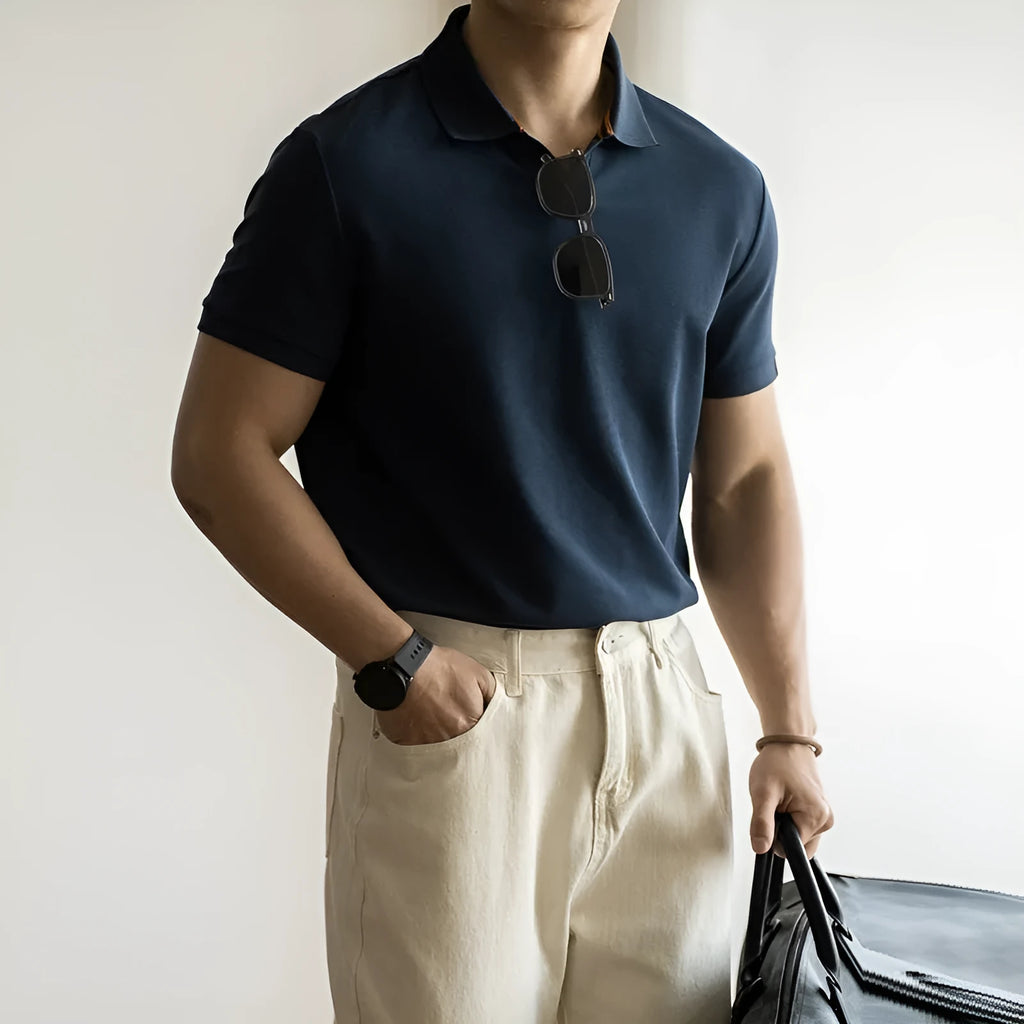 Cotton polyester blend polo shirt in blue colour showing short sleeves and regular cut design