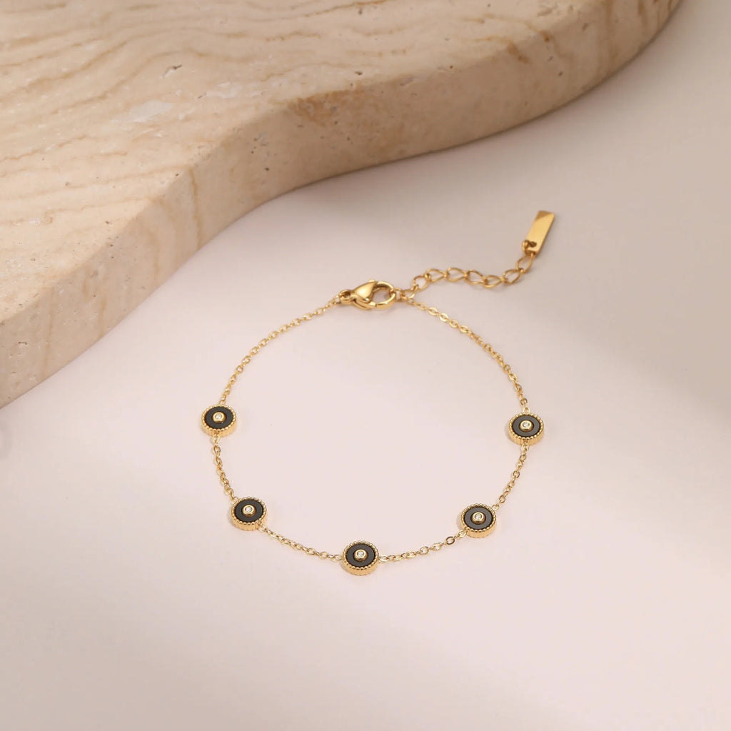 Women's stainless steel bracelet with electroplated 18K gold plating and geometric fritillary design